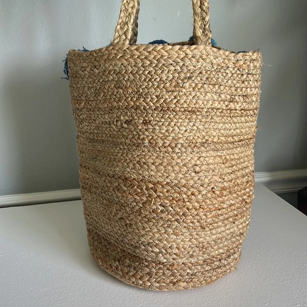 - Anthropologie Jute Braided Tote bag with  Pom Pom